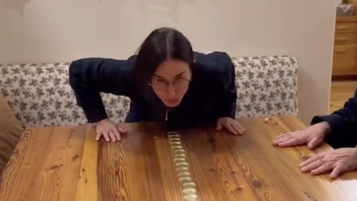 Demi Moore and daughters in stitches over viral Christmas challenge | Lifestyle