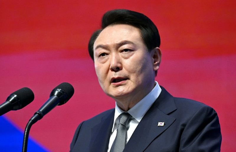 South Korea imposes travel ban on President Yoon