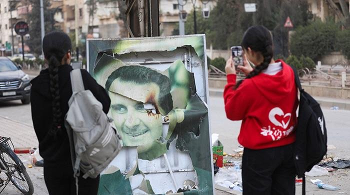 Assad ‘flies out’ of Syria, confirms Russia as rebels announce curfew in Damascus