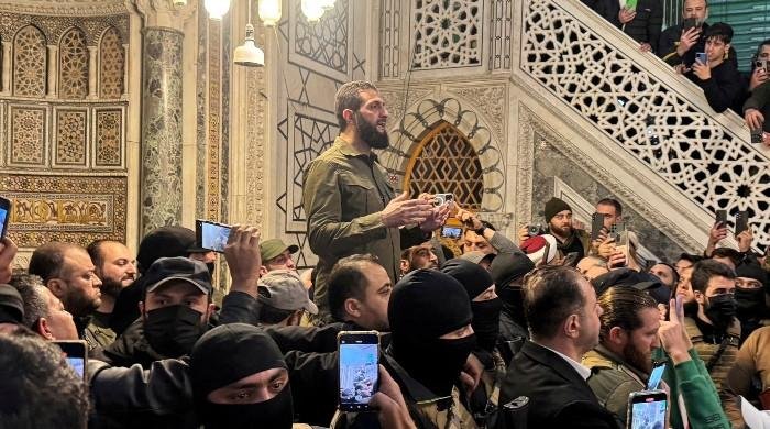 Syria’s rebel leader vows to dissolve Assad regime security forces, close prisons