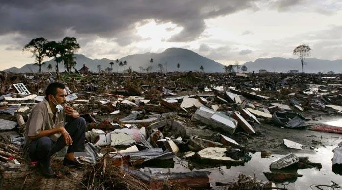 Tears, prayers as Asia mourns tsunami dead 20 years on