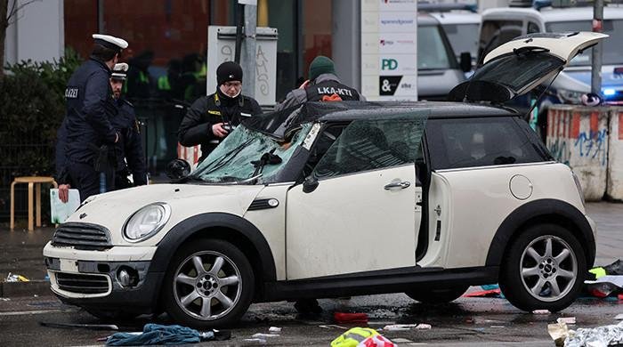 Afghan asylum-seeker drives into Munich crowd, hurts 28 in suspected attack Afghan asylum-seeker drives into Munich crowd, hurts 28 in suspected attack