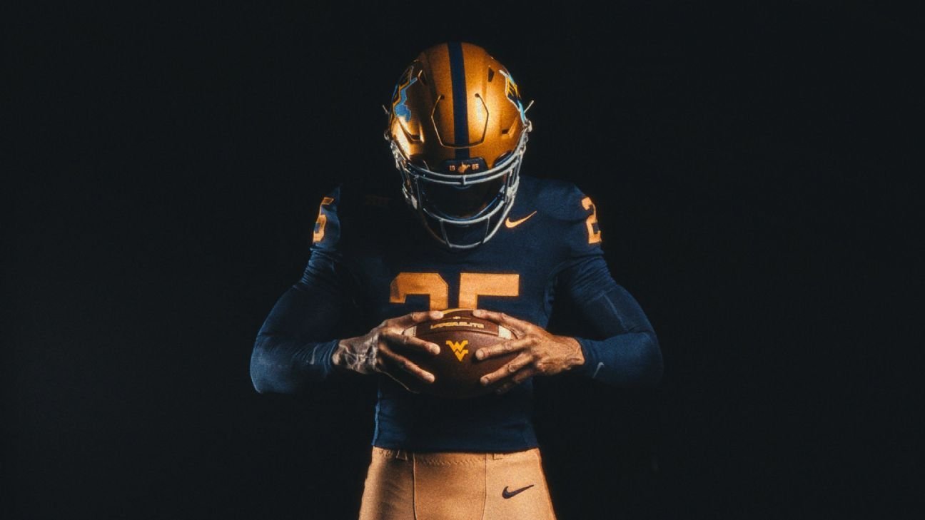 West Virginia football unveils throwback ‘old gold’ uniforms West Virginia football unveils throwback ‘old gold’ uniforms
