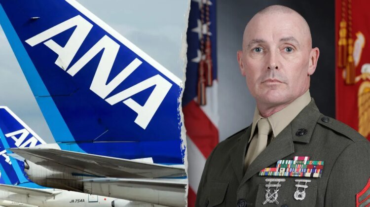 Marine restrains man who tried to open emergency exit on flight: report Marine restrains man who tried to open emergency exit on flight: report