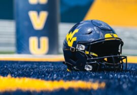 West Virginia Mountaineers Return To Glossy Football Helmets – SportsLogos.Net News