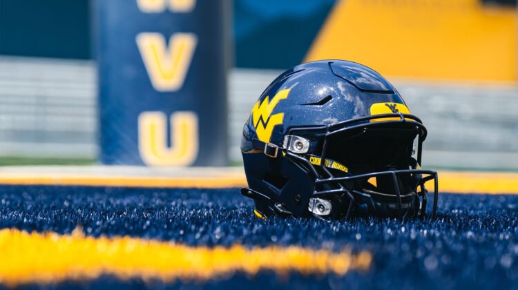 West Virginia Mountaineers Return To Glossy Football Helmets – SportsLogos.Net News