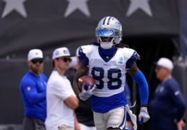 CeeDee Lamb, in street garb, flagged after getting hit by official on sideline