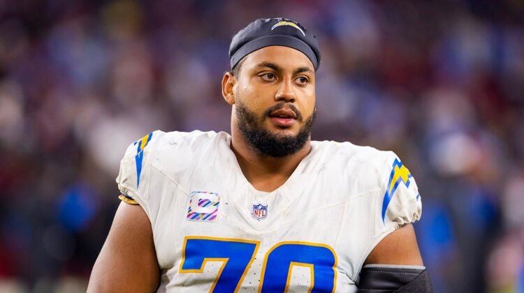 Chargers on edge after star lineman Rashawn Slater was carted off field